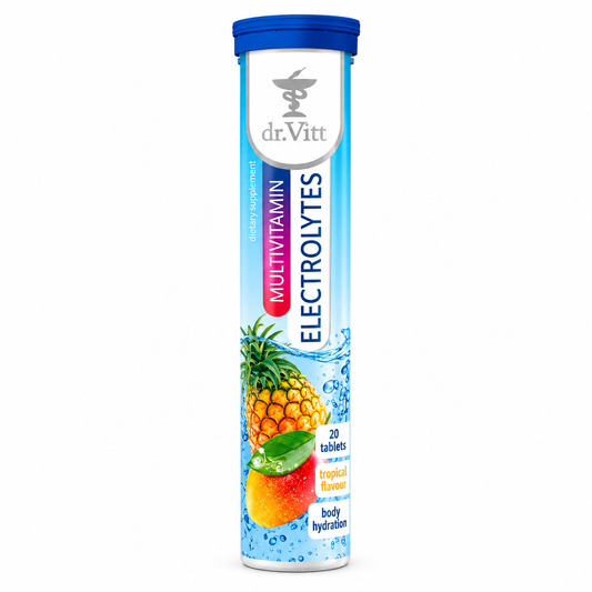 A tall cylindrical tube of dr.Vitt Multivitamin Electrolytes in tropical flavor, featuring blue and white packaging with illustrations of a pineapple and a mango.