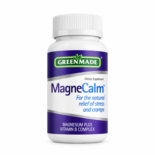 A white plastic bottle of Greenmade Magnesium supplement with a purple and white label, on a clean white background.